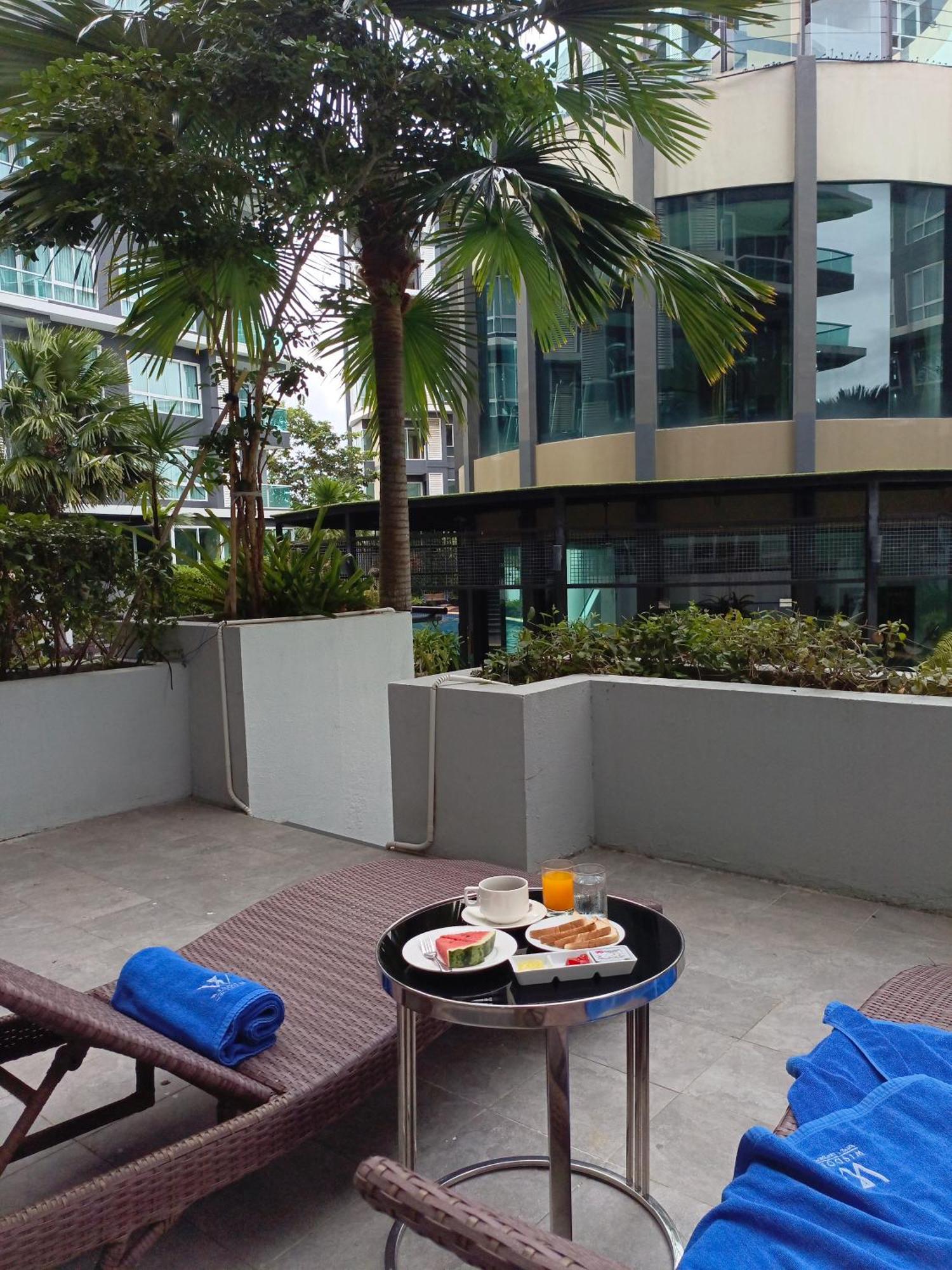 Wisdom Hotel & Residence Районг Экстерьер фото