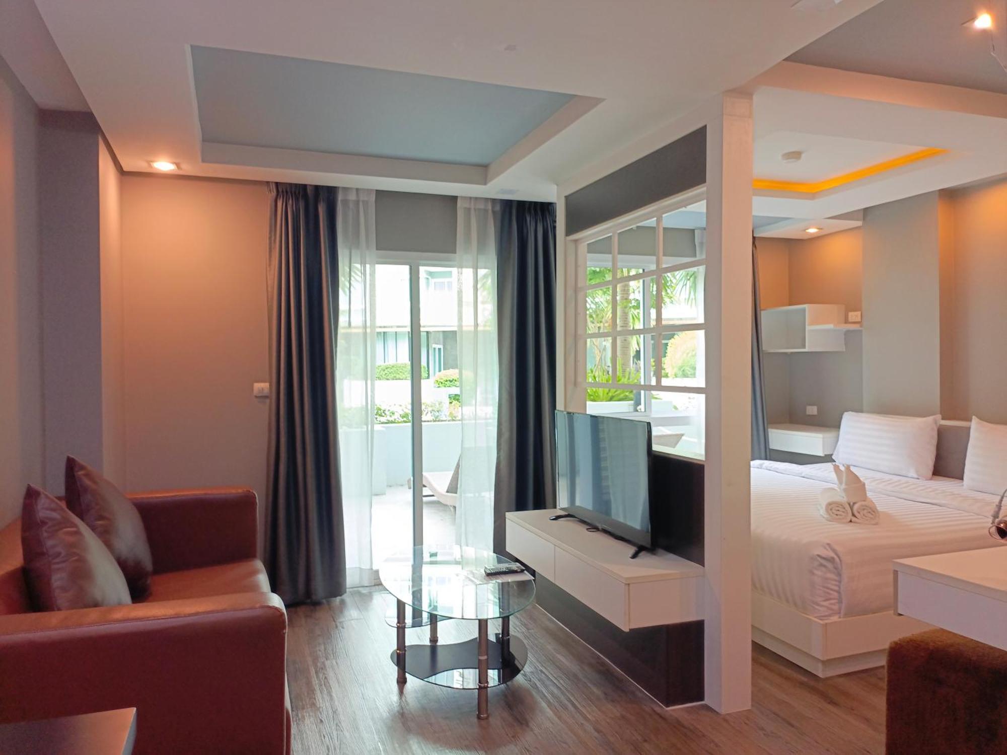Wisdom Hotel & Residence Районг Экстерьер фото