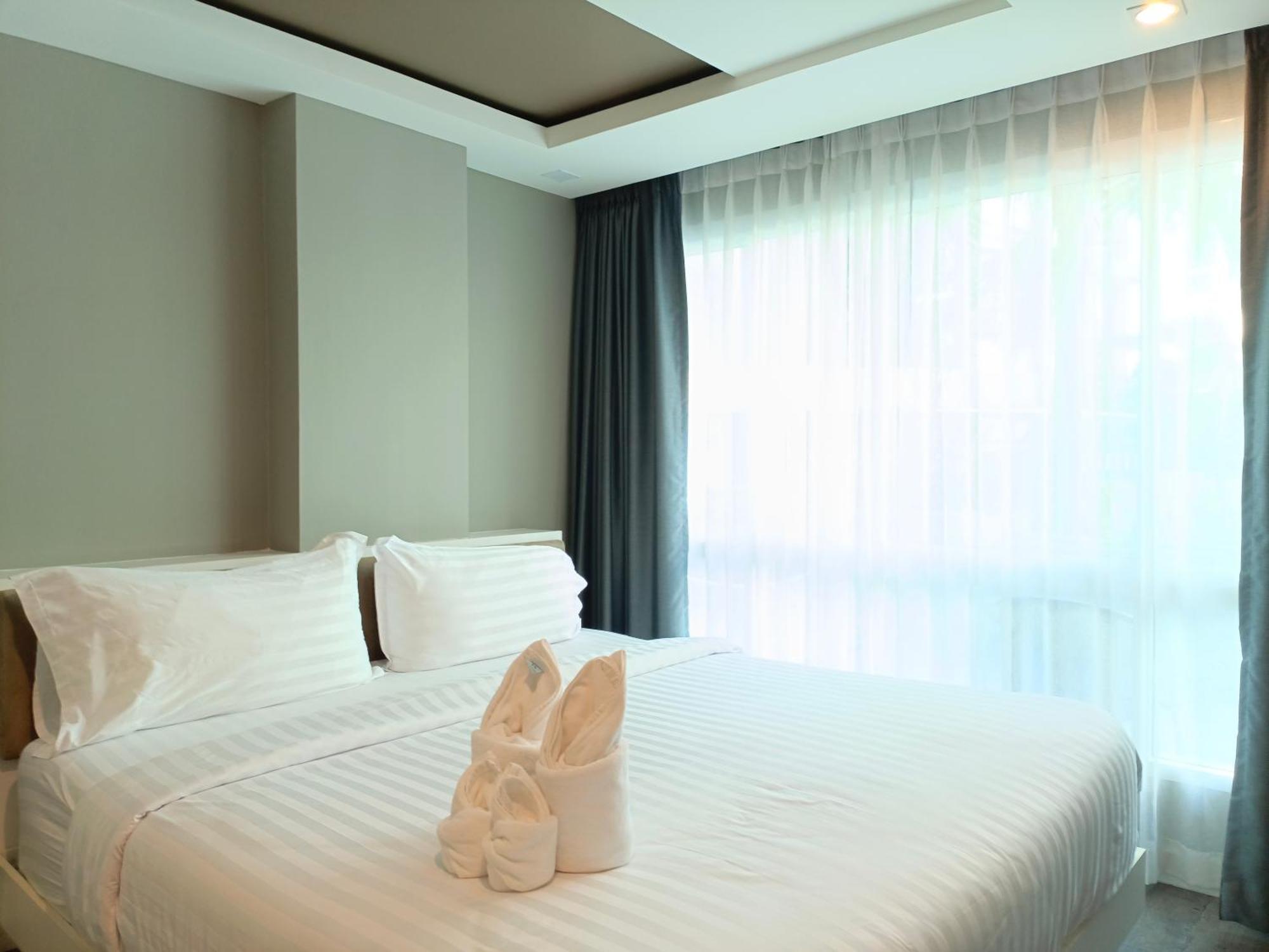 Wisdom Hotel & Residence Районг Экстерьер фото