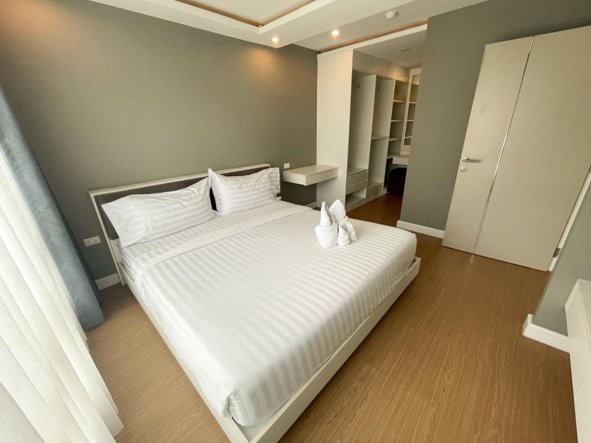 Wisdom Hotel & Residence Районг Экстерьер фото