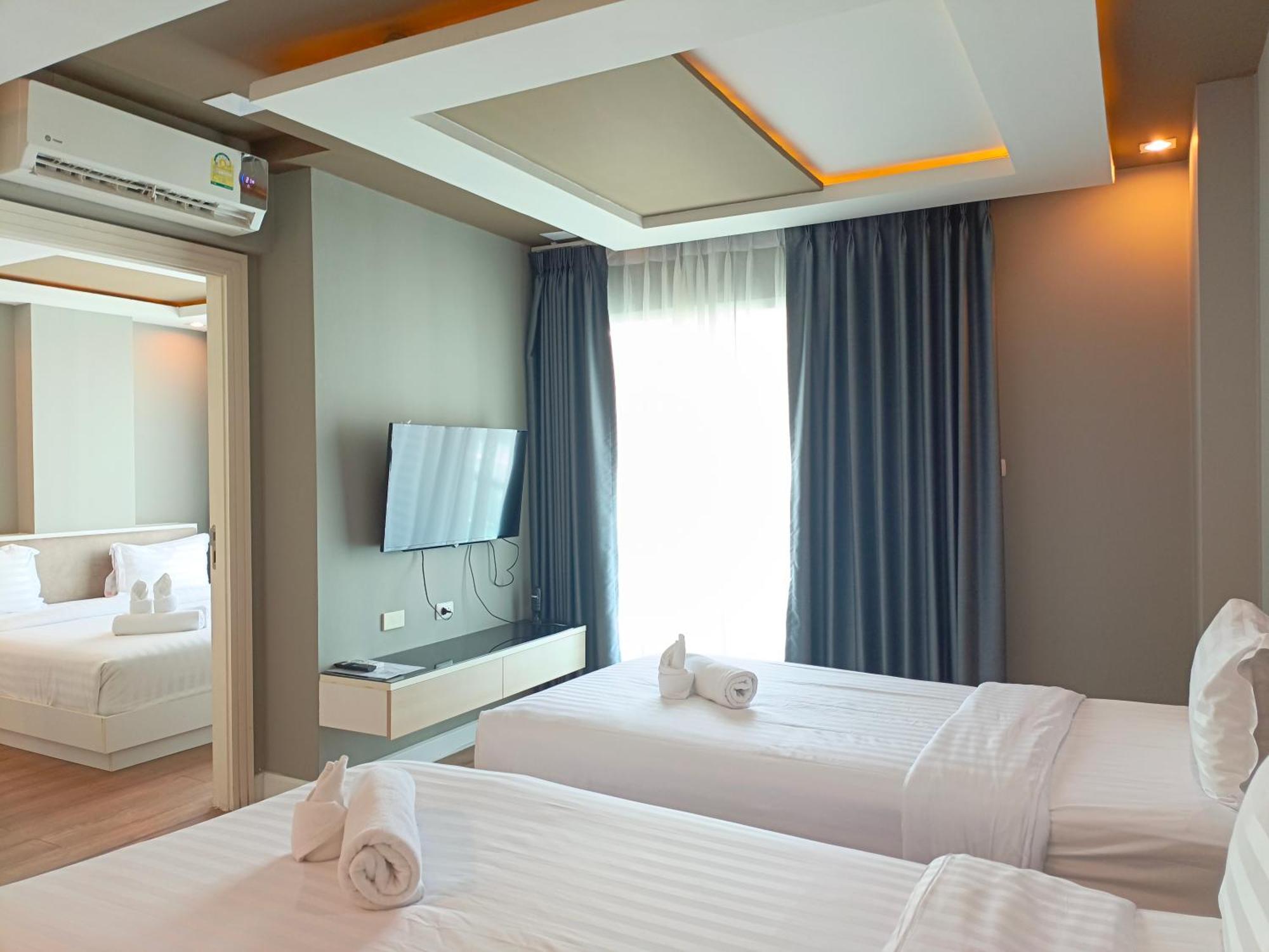 Wisdom Hotel & Residence Районг Экстерьер фото