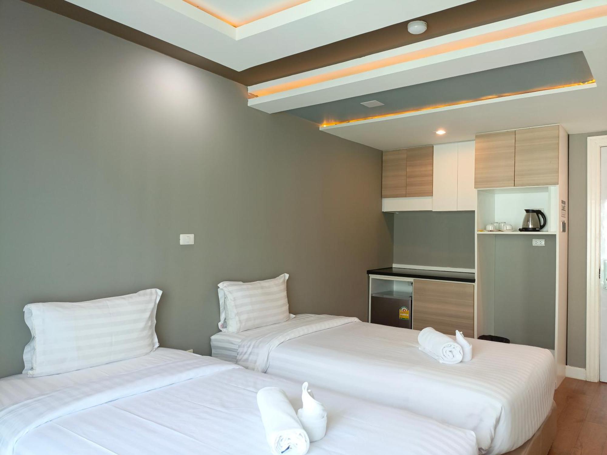Wisdom Hotel & Residence Районг Экстерьер фото