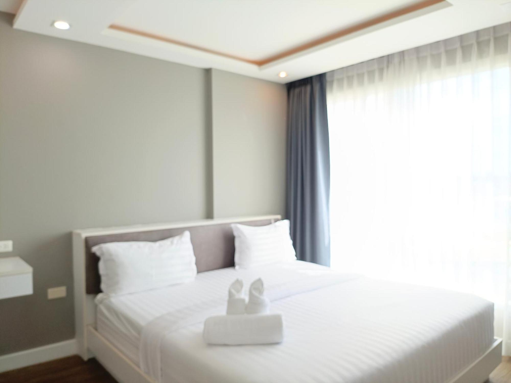 Wisdom Hotel & Residence Районг Экстерьер фото
