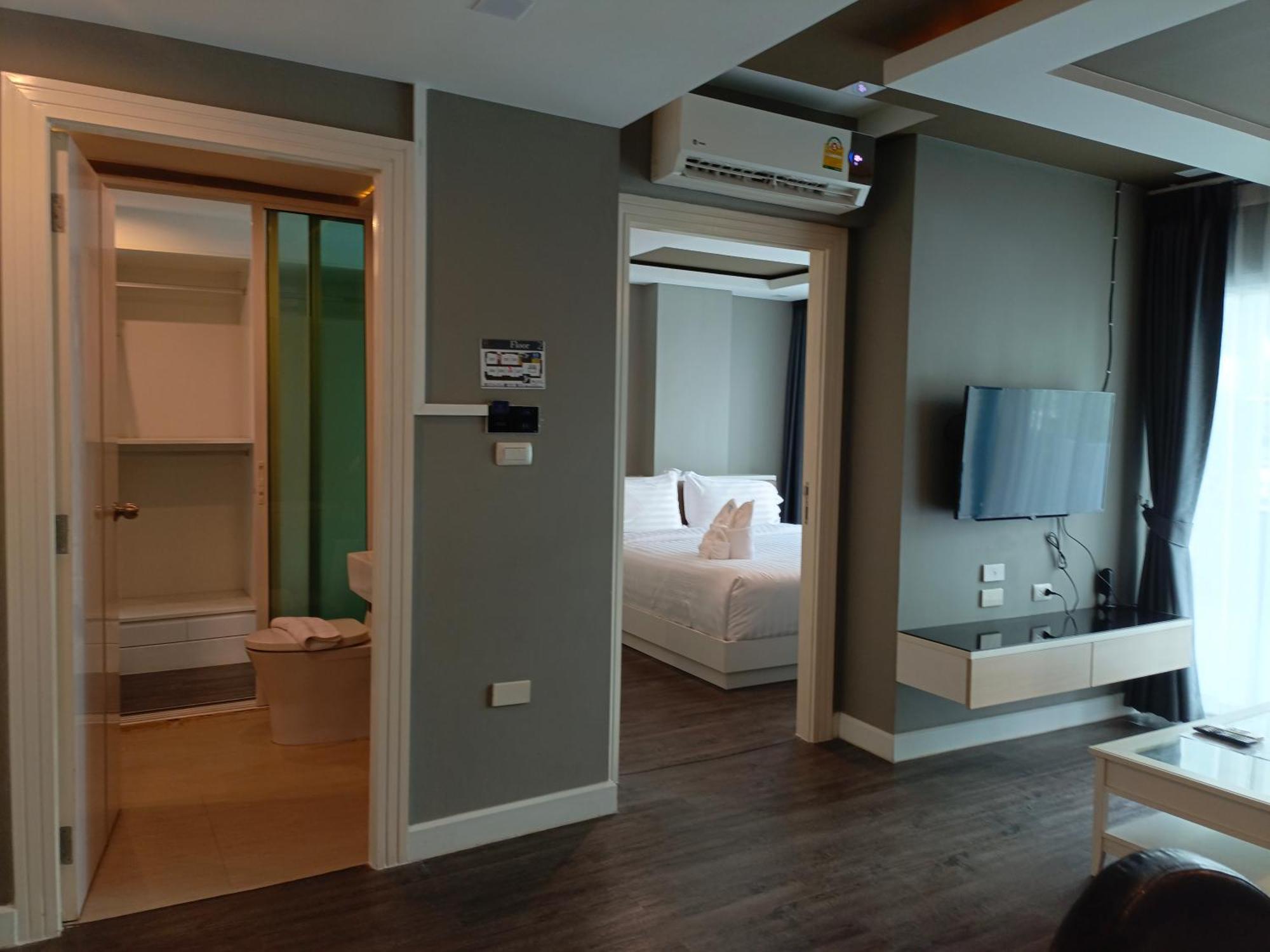 Wisdom Hotel & Residence Районг Экстерьер фото