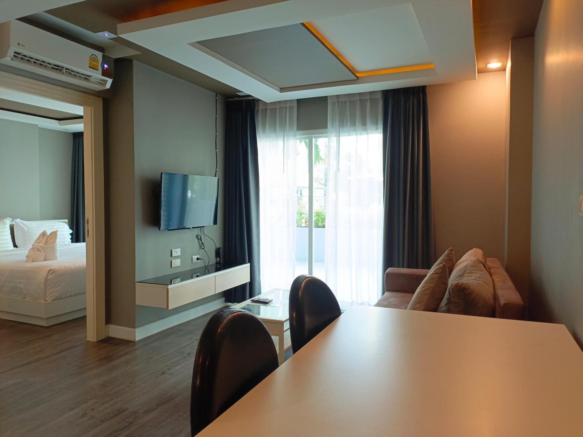 Wisdom Hotel & Residence Районг Экстерьер фото