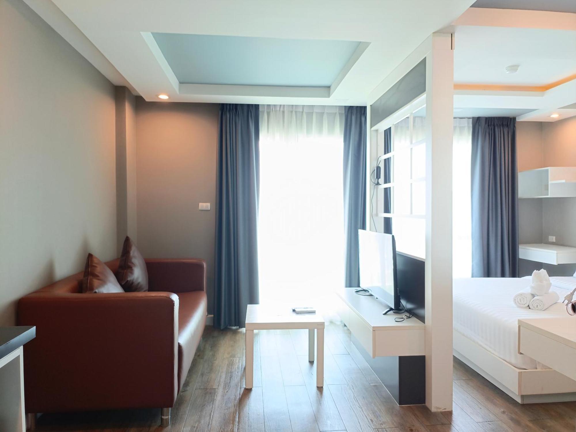 Wisdom Hotel & Residence Районг Экстерьер фото