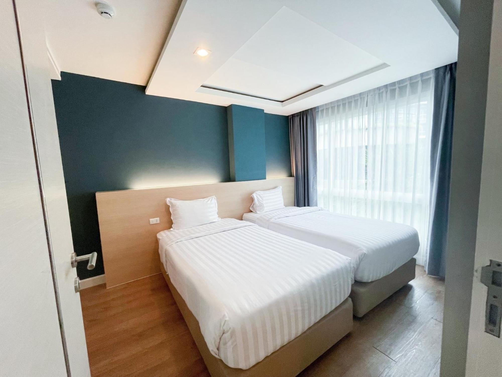 Wisdom Hotel & Residence Районг Экстерьер фото