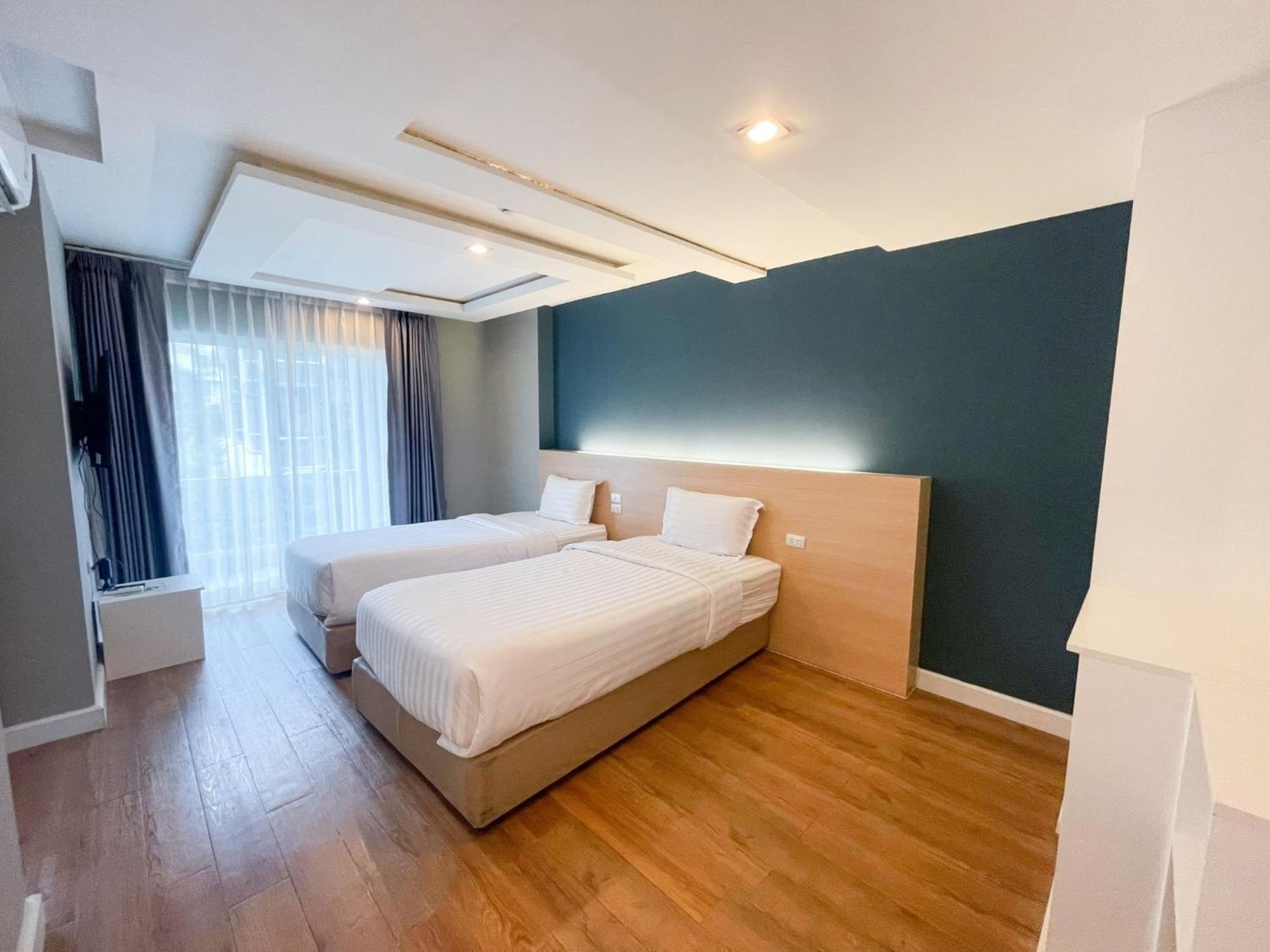 Wisdom Hotel & Residence Районг Экстерьер фото