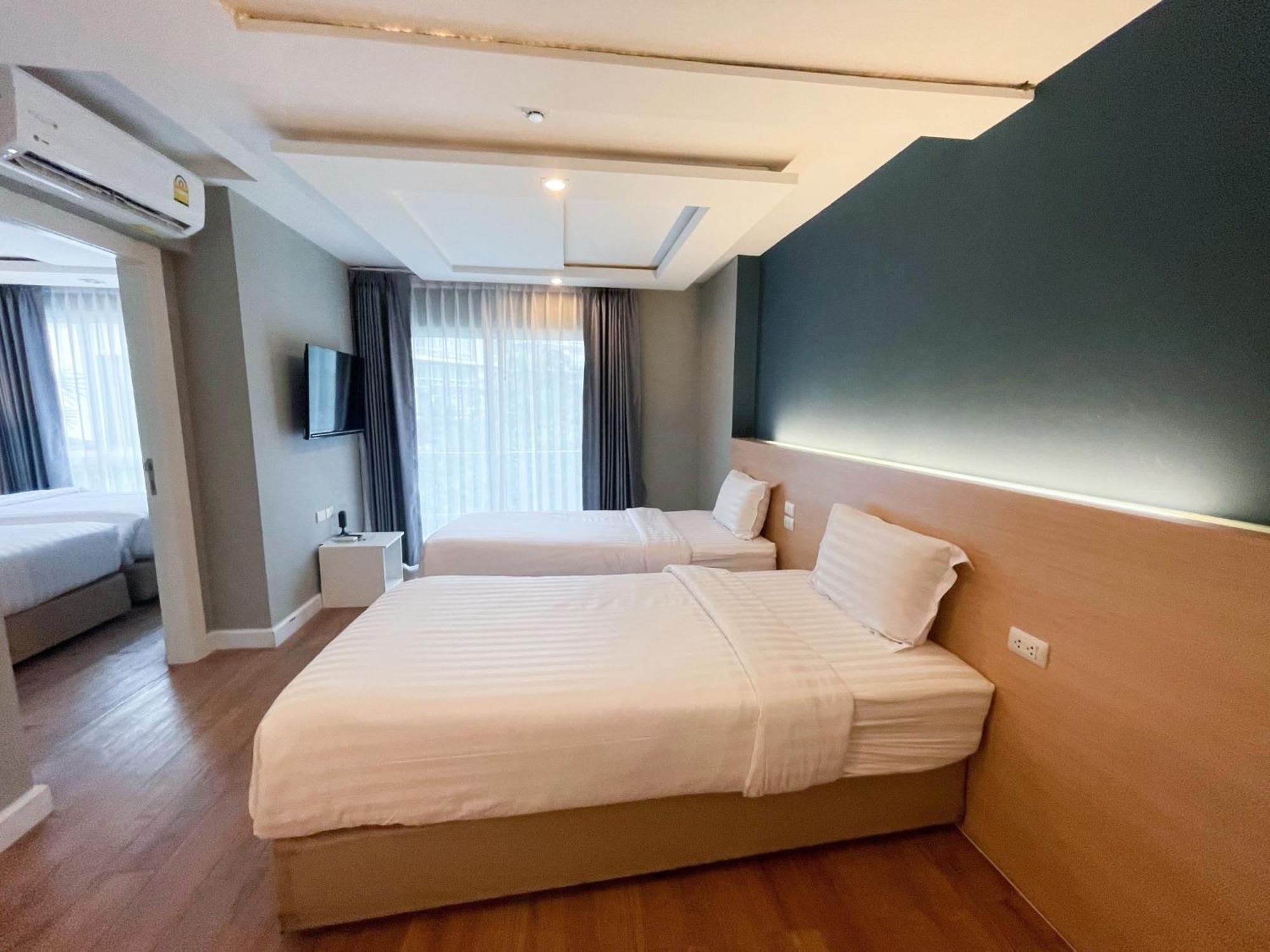 Wisdom Hotel & Residence Районг Экстерьер фото