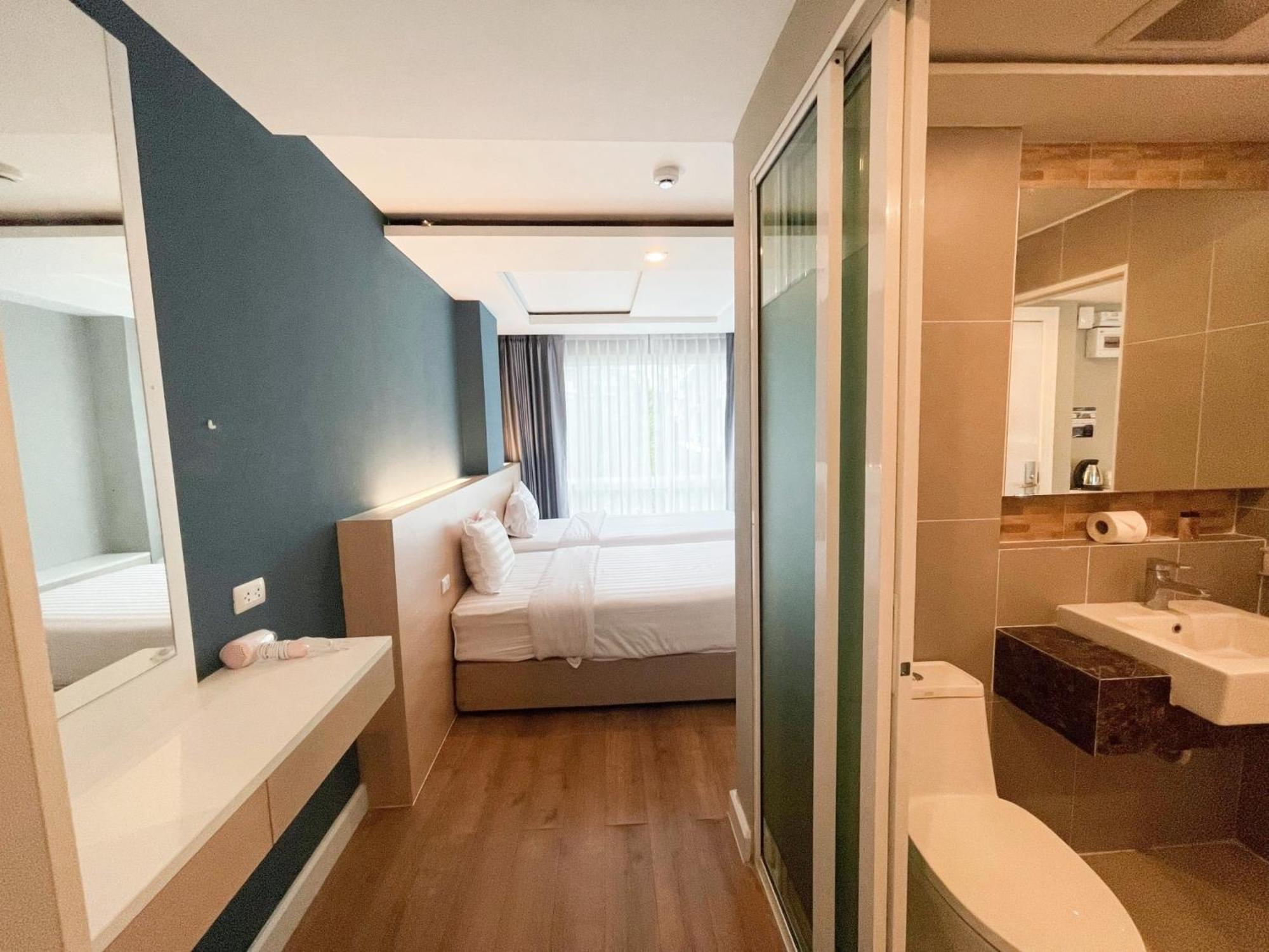 Wisdom Hotel & Residence Районг Экстерьер фото