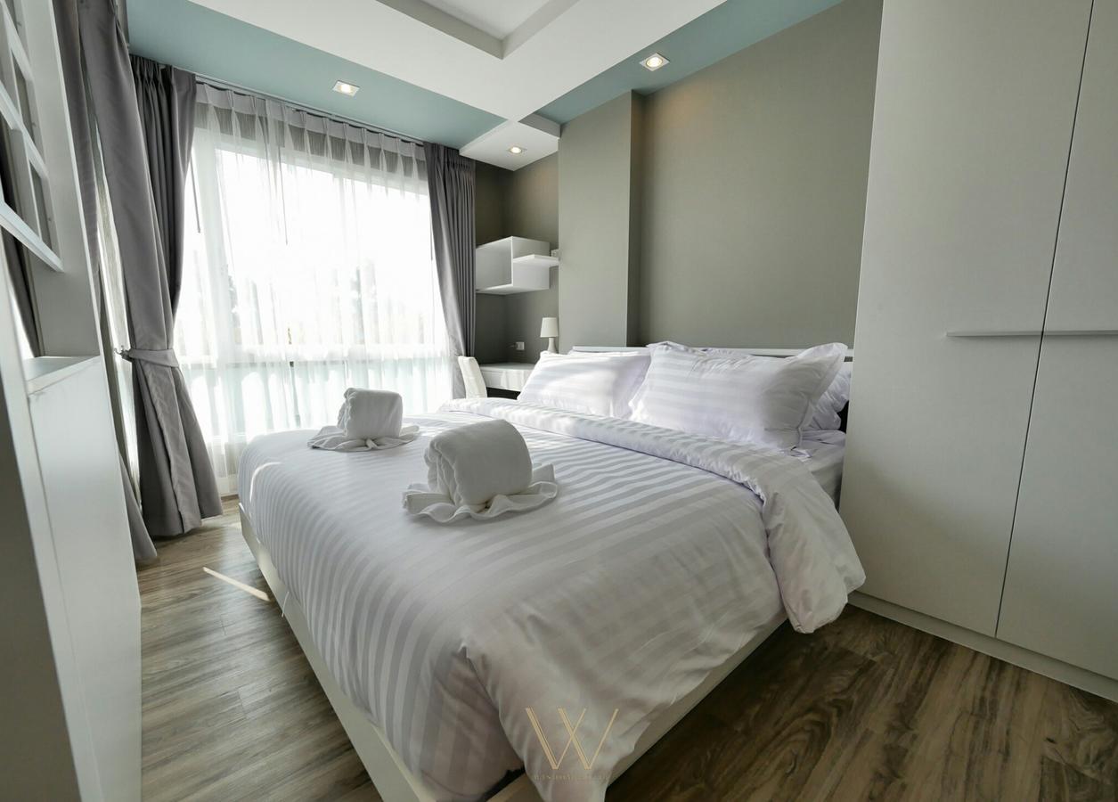 Wisdom Hotel & Residence Районг Экстерьер фото
