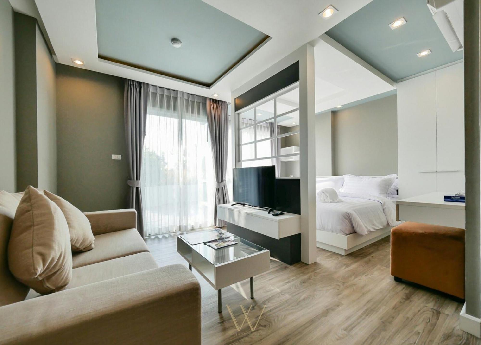 Wisdom Hotel & Residence Районг Экстерьер фото